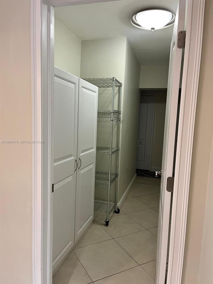 685 West 77th Street Hialeah, FL 33014 - Photo 24 of 35 a bathroom with a shower and a sink