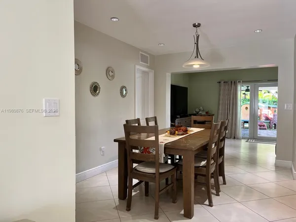 a view of a dining room with furniture