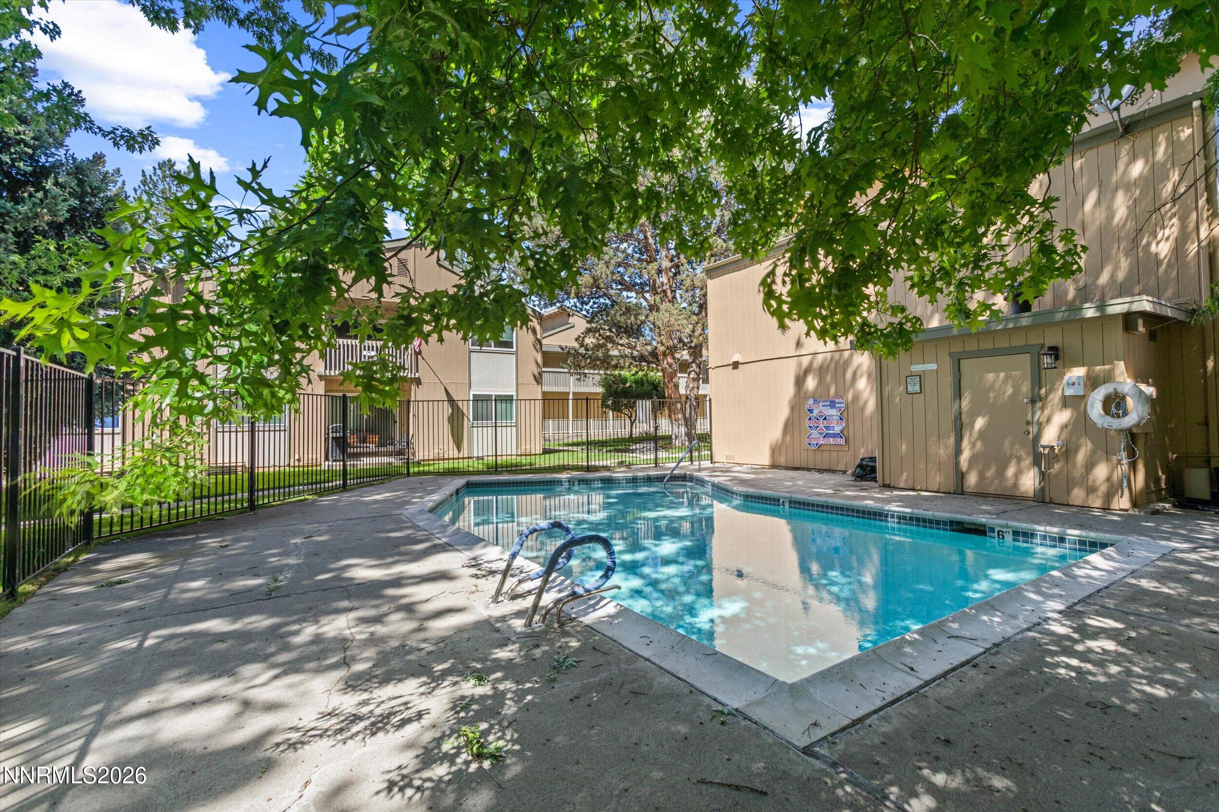 2300 Dickerson Road, Unit 51 Reno, NV 89503 - Photo 28 of 46 a view of a house with pool and sitting area