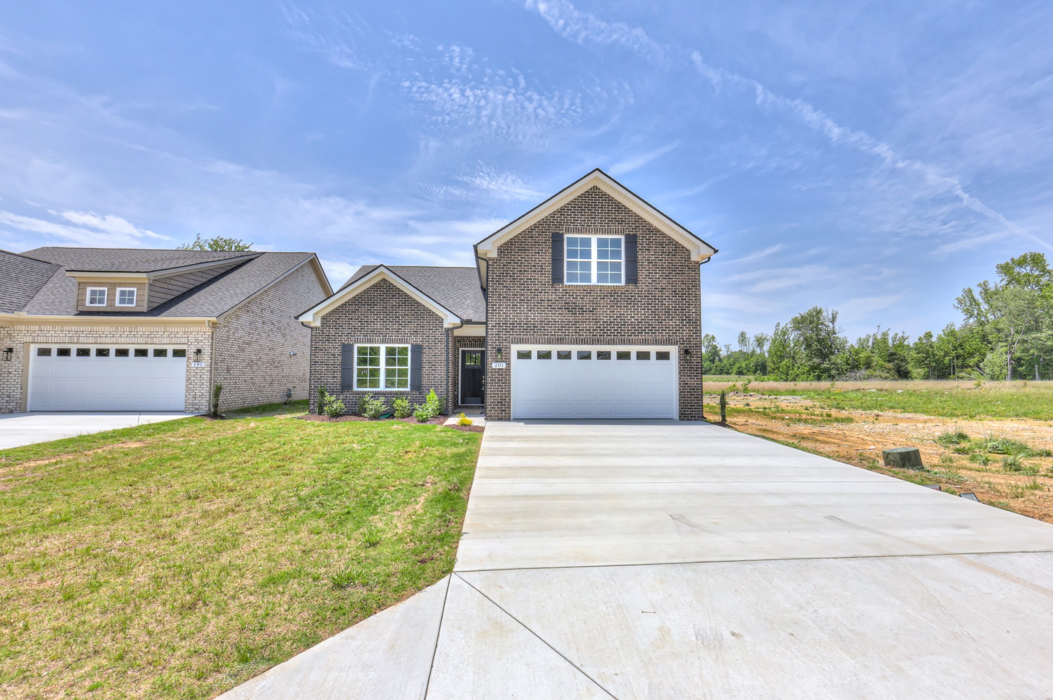 201 North Fork Branch Road Tullahoma, TN 37388 - Photo 2 of 31 a view of an house with backyard and garden