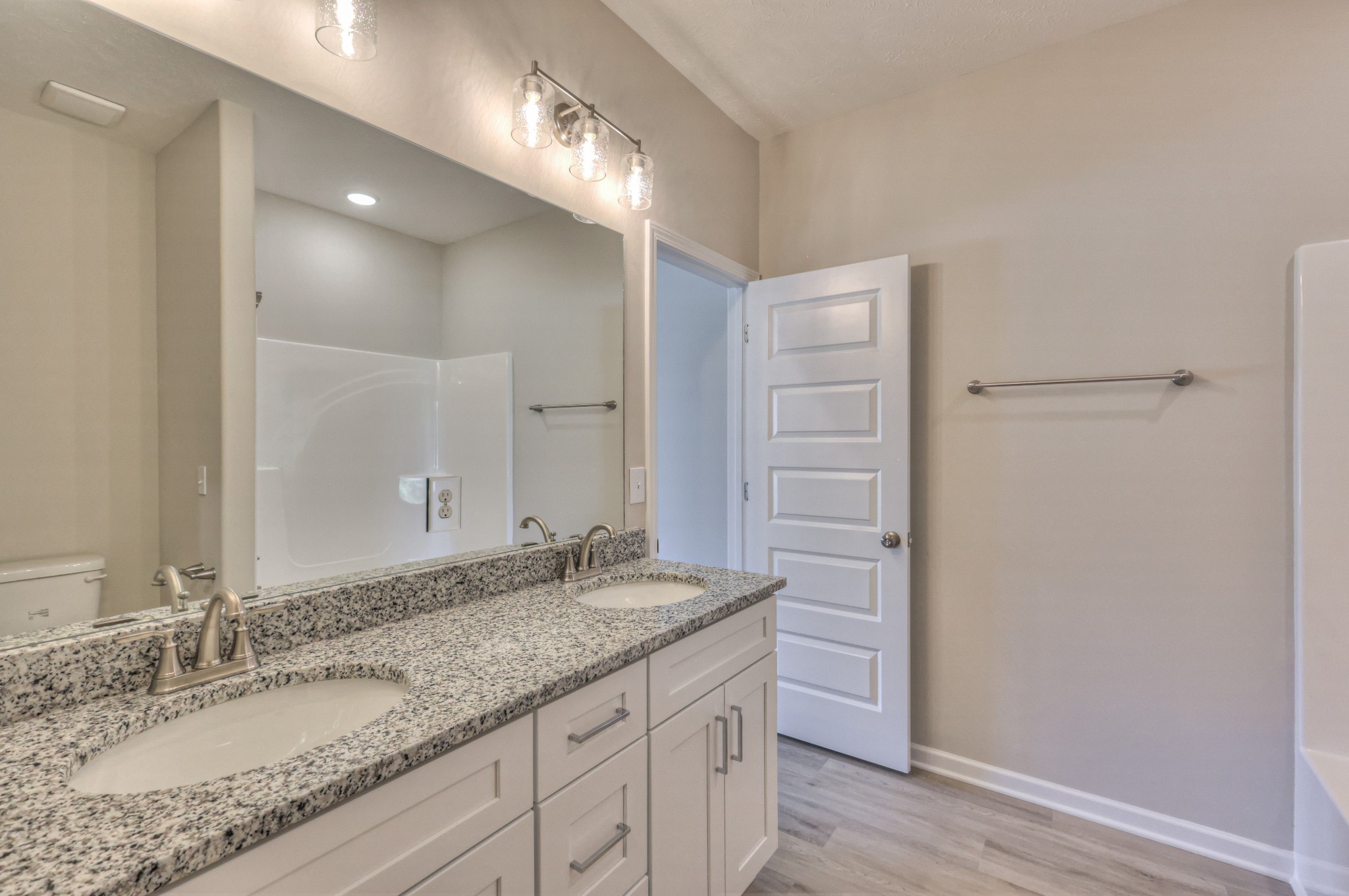 201 North Fork Branch Road Tullahoma, TN 37388 - Photo 9 of 31 a bathroom with a granite countertop sink and a mirror