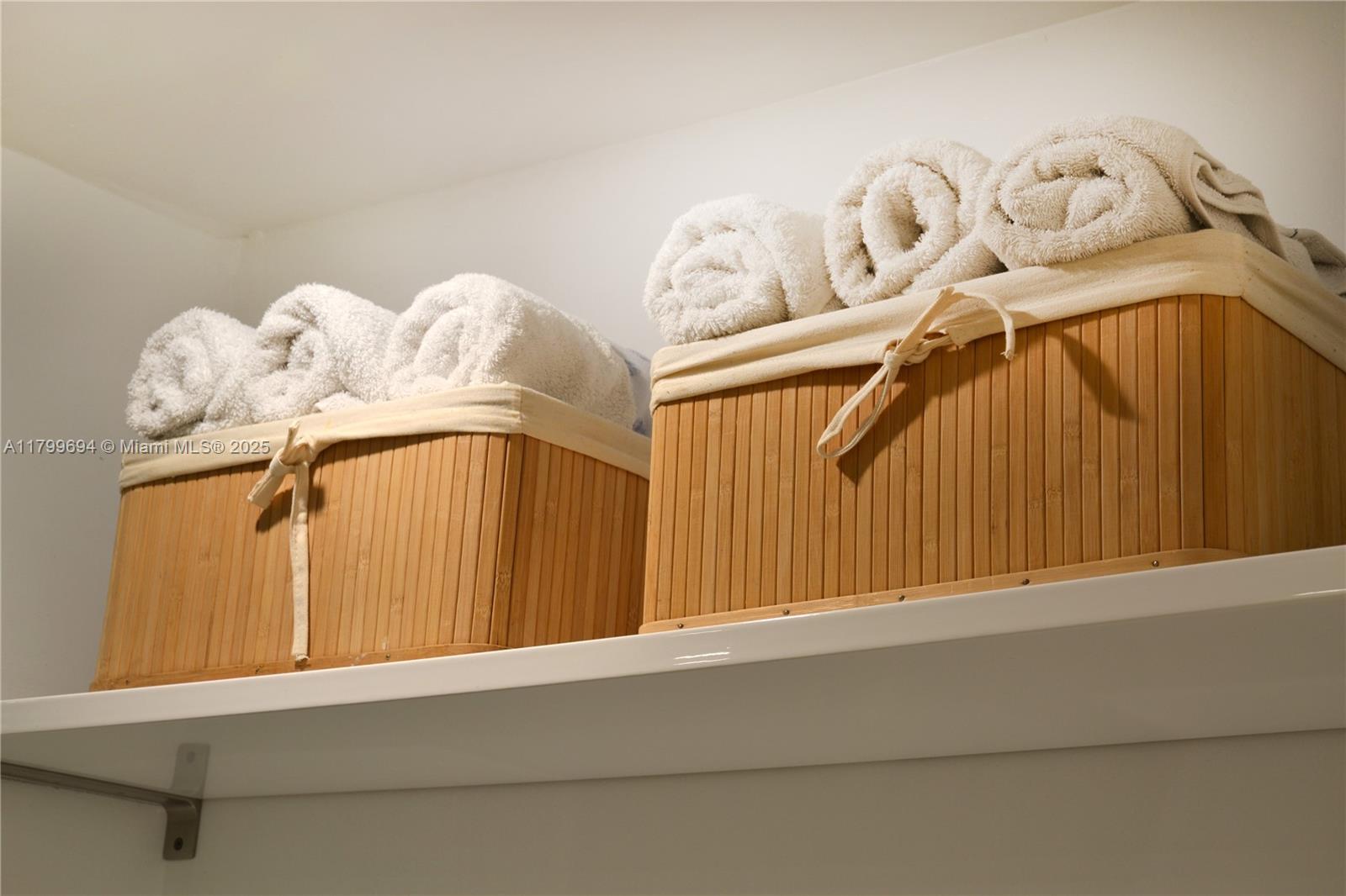 1121 Crandon Boulevard, Unit E307 Key Biscayne, FL 33149 - Photo 18 of 30 a view of a chandelier in a room