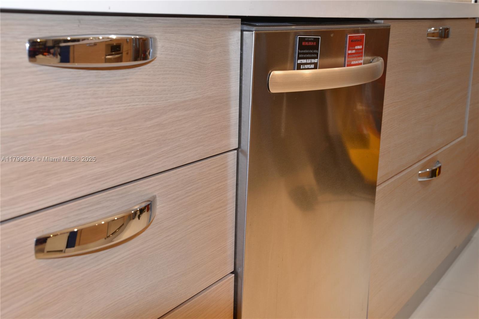 1121 Crandon Boulevard, Unit E307 Key Biscayne, FL 33149 - Photo 7 of 30 a bathroom with a sink and a mirror