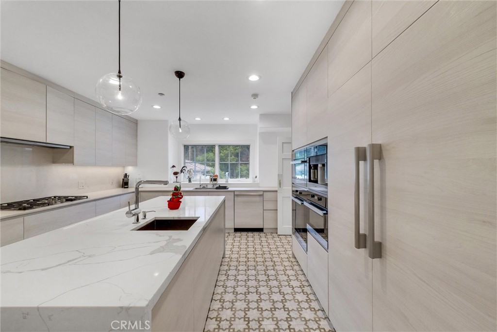 1145 Rancho Road Arcadia, CA 91006 - Photo 12 of 60 a kitchen with stainless steel appliances a refrigerator and a stove top oven