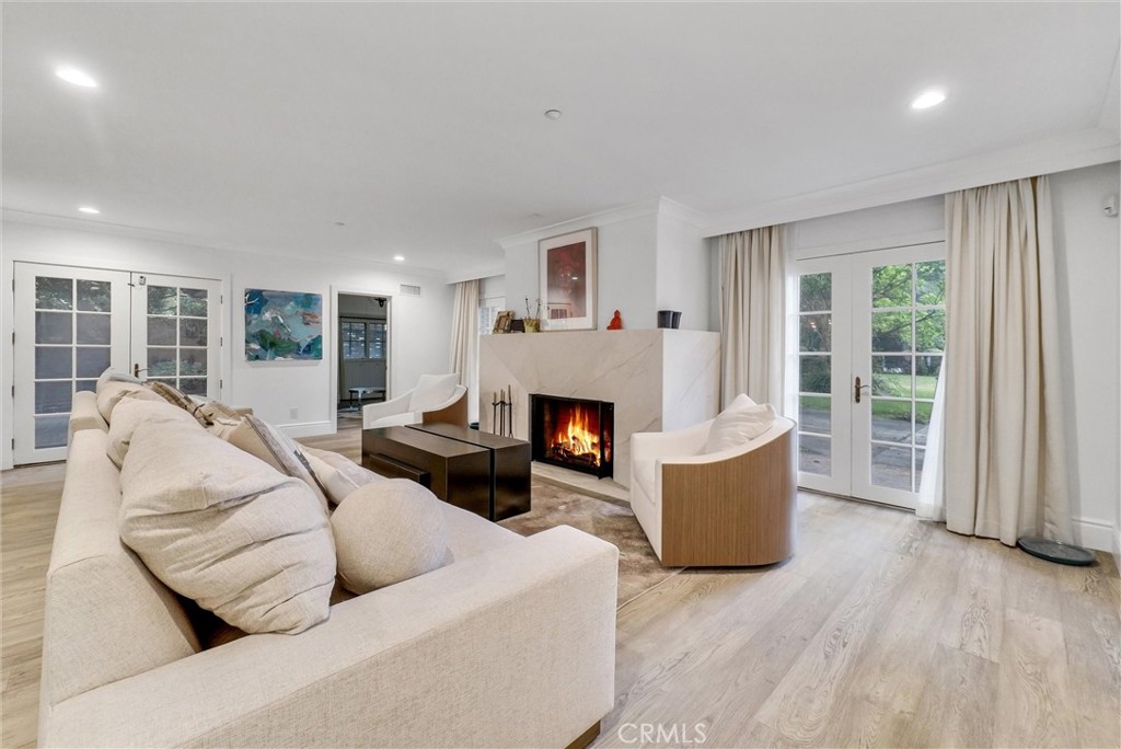 1145 Rancho Road Arcadia, CA 91006 - Photo 20 of 60 a living room with furniture and a fireplace