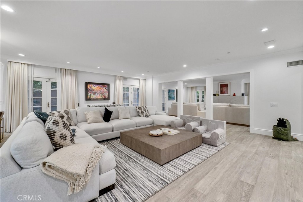 1145 Rancho Road Arcadia, CA 91006 - Photo 23 of 60 a living room with furniture white walls and wooden floor
