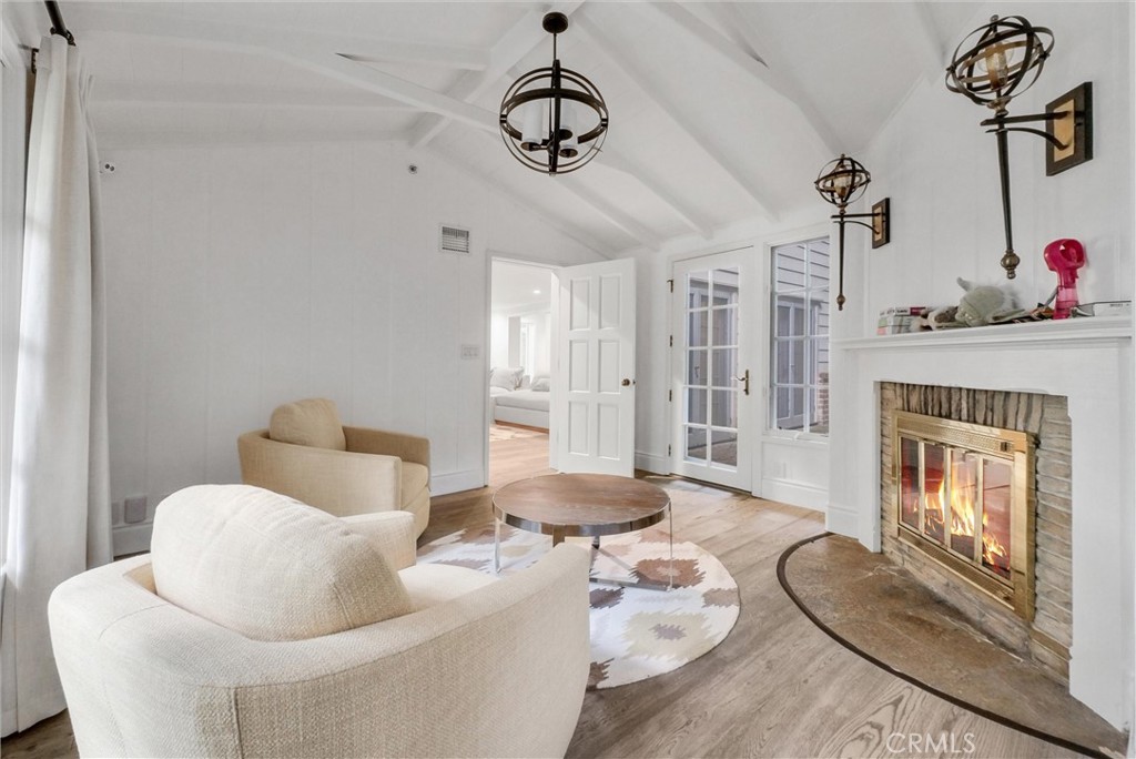 1145 Rancho Road Arcadia, CA 91006 - Photo 28 of 60 a living room with furniture and a fireplace