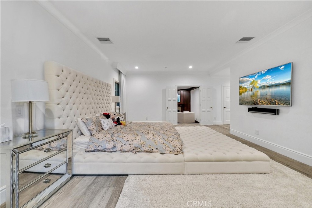 1145 Rancho Road Arcadia, CA 91006 - Photo 52 of 60 a living room with furniture and a flat screen tv