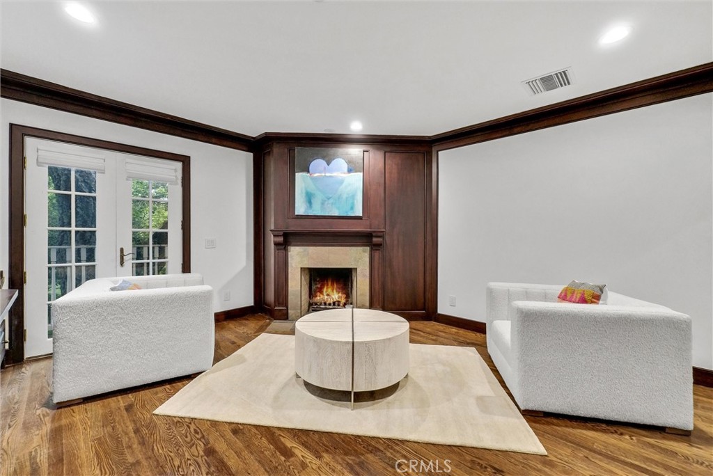 1145 Rancho Road Arcadia, CA 91006 - Photo 55 of 60 a living room with furniture and a fireplace