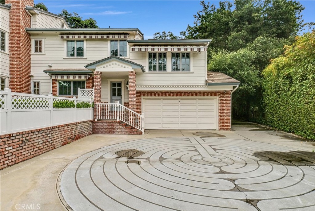 1145 Rancho Road Arcadia, CA 91006 - Photo 57 of 60 a view of a house with a small yard and wooden floor and fence