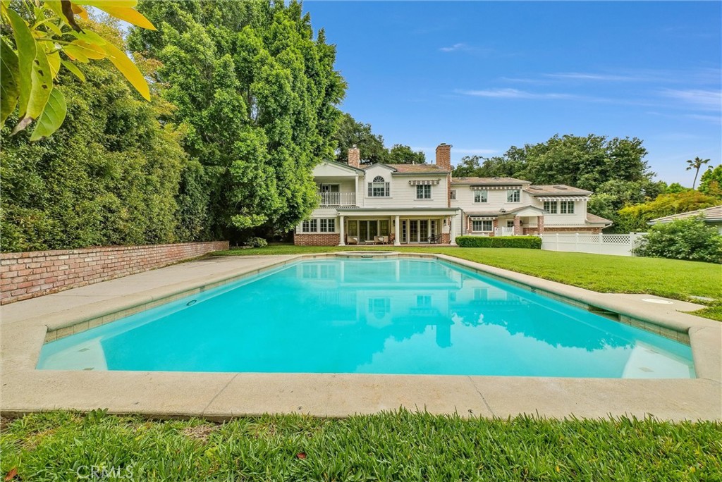 1145 Rancho Road Arcadia, CA 91006 - Photo 60 of 60 a view of an swimming pool with lawn chairs and plants