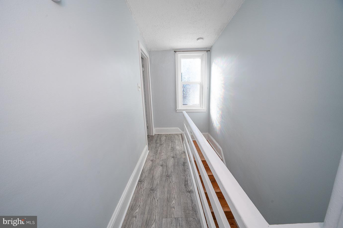 4522 Smick Street Philadelphia, PA 19127 - Photo 30 of 36 a view of a hallway with wooden floor