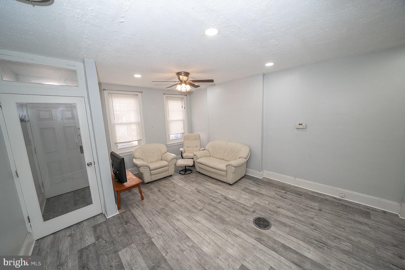 4522 Smick Street Philadelphia, PA 19127 - Photo 6 of 36 a living room with furniture and a mirror