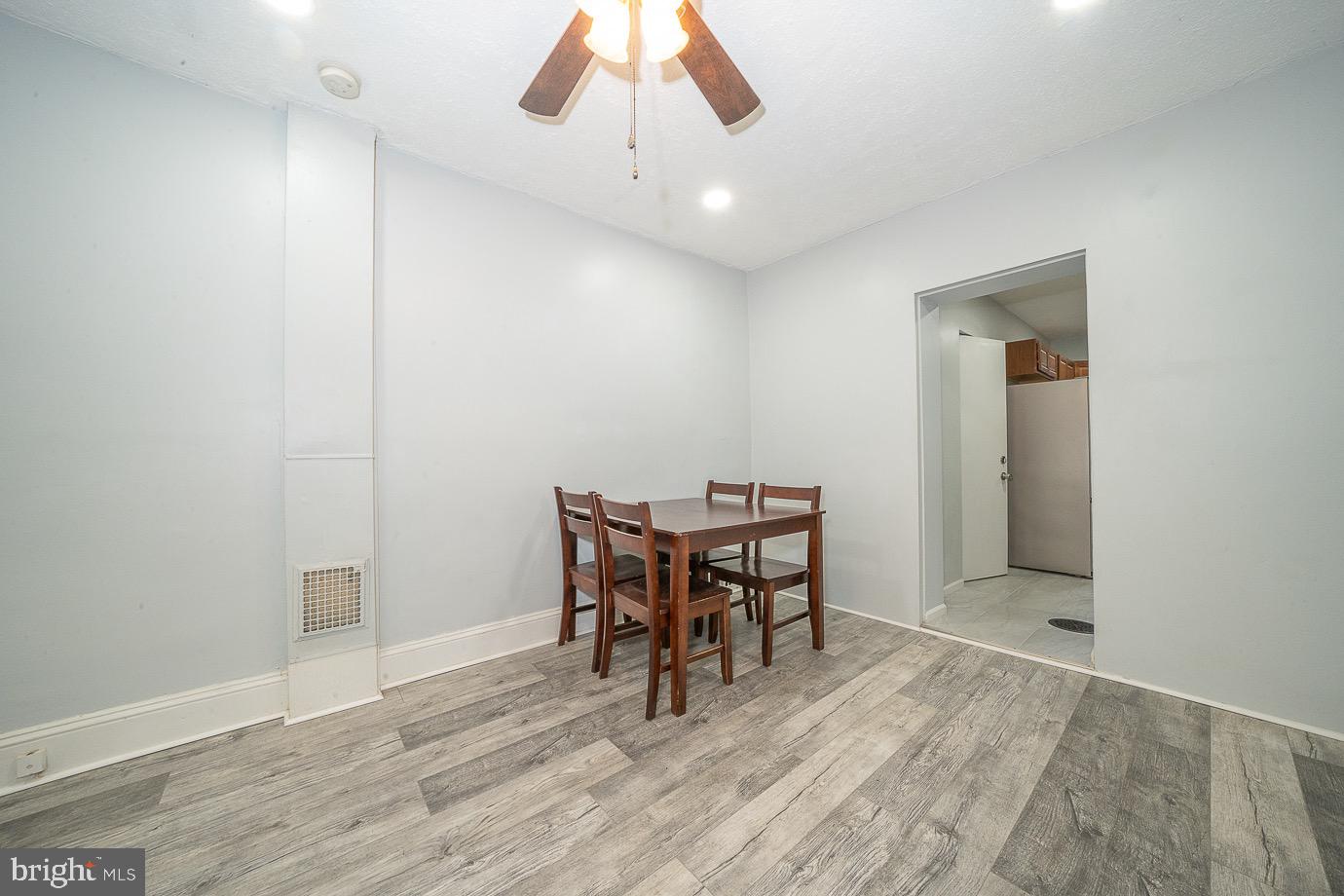 4522 Smick Street Philadelphia, PA 19127 - Photo 10 of 36 a view of a dining room with furniture and wooden floor