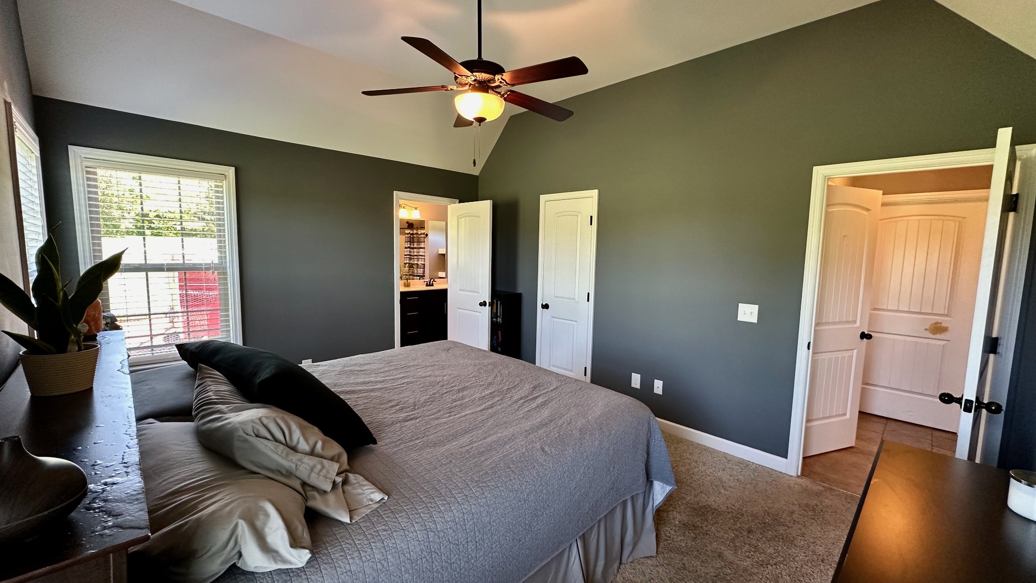 509 Neal Road Watertown, TN 37184 - Photo 27 of 48 a bedroom with a bed and a chandelier