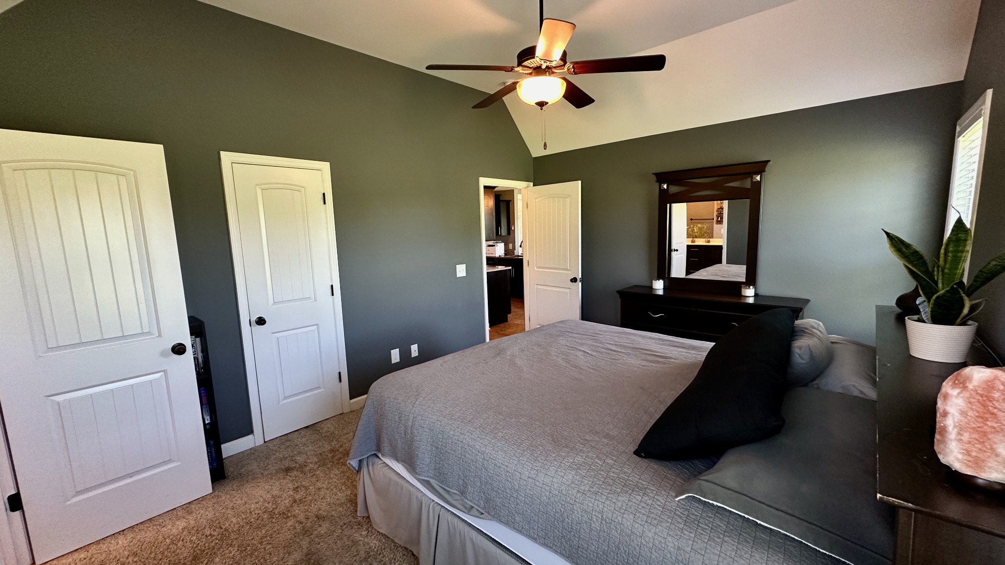 509 Neal Road Watertown, TN 37184 - Photo 28 of 48 a bedroom with a bed and a chandelier