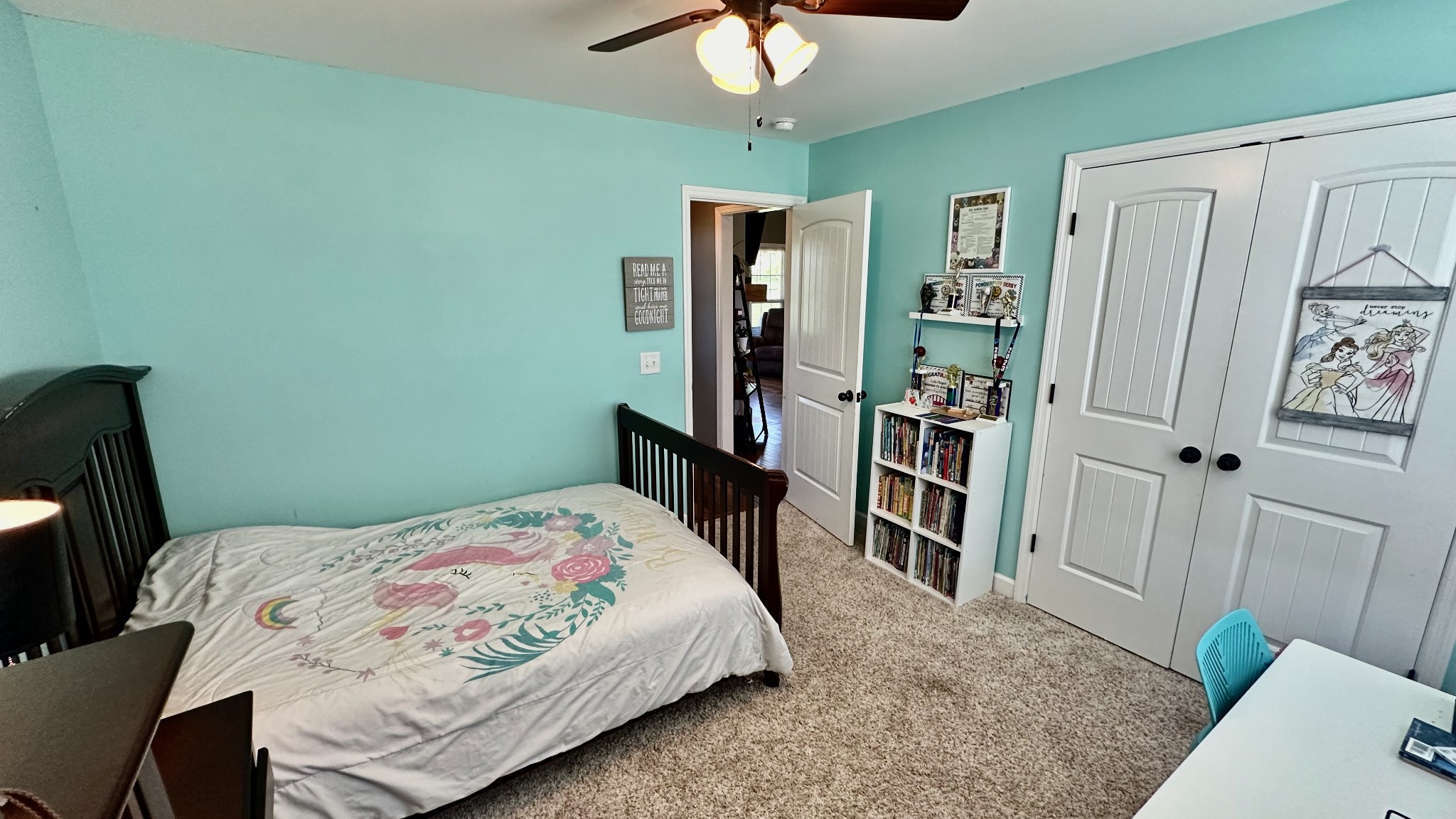 509 Neal Road Watertown, TN 37184 - Photo 31 of 48 a bedroom with a bed and a flat tv screen on the dresser