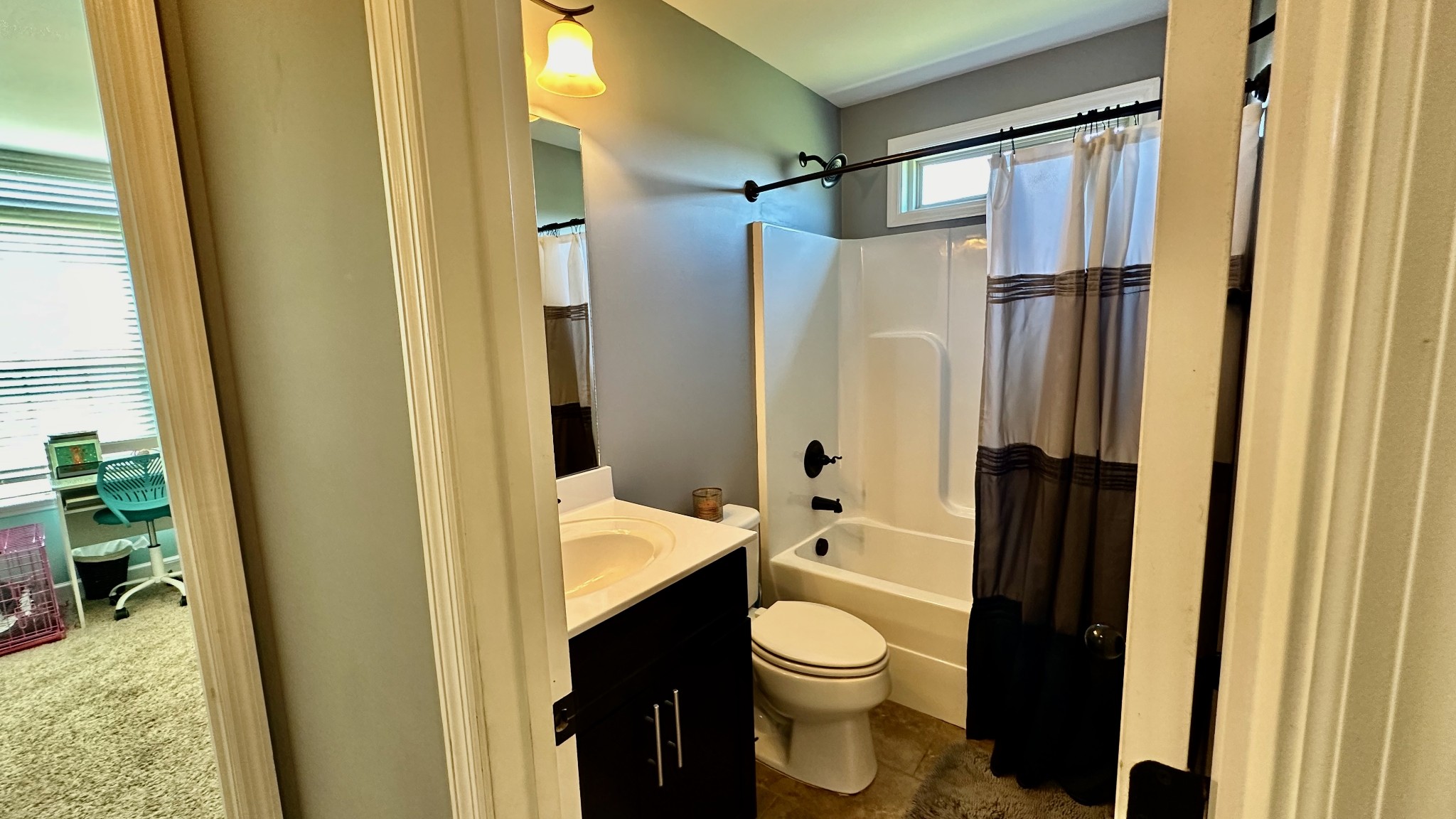 509 Neal Road Watertown, TN 37184 - Photo 33 of 48 a bathroom with a sink a toilet and shower