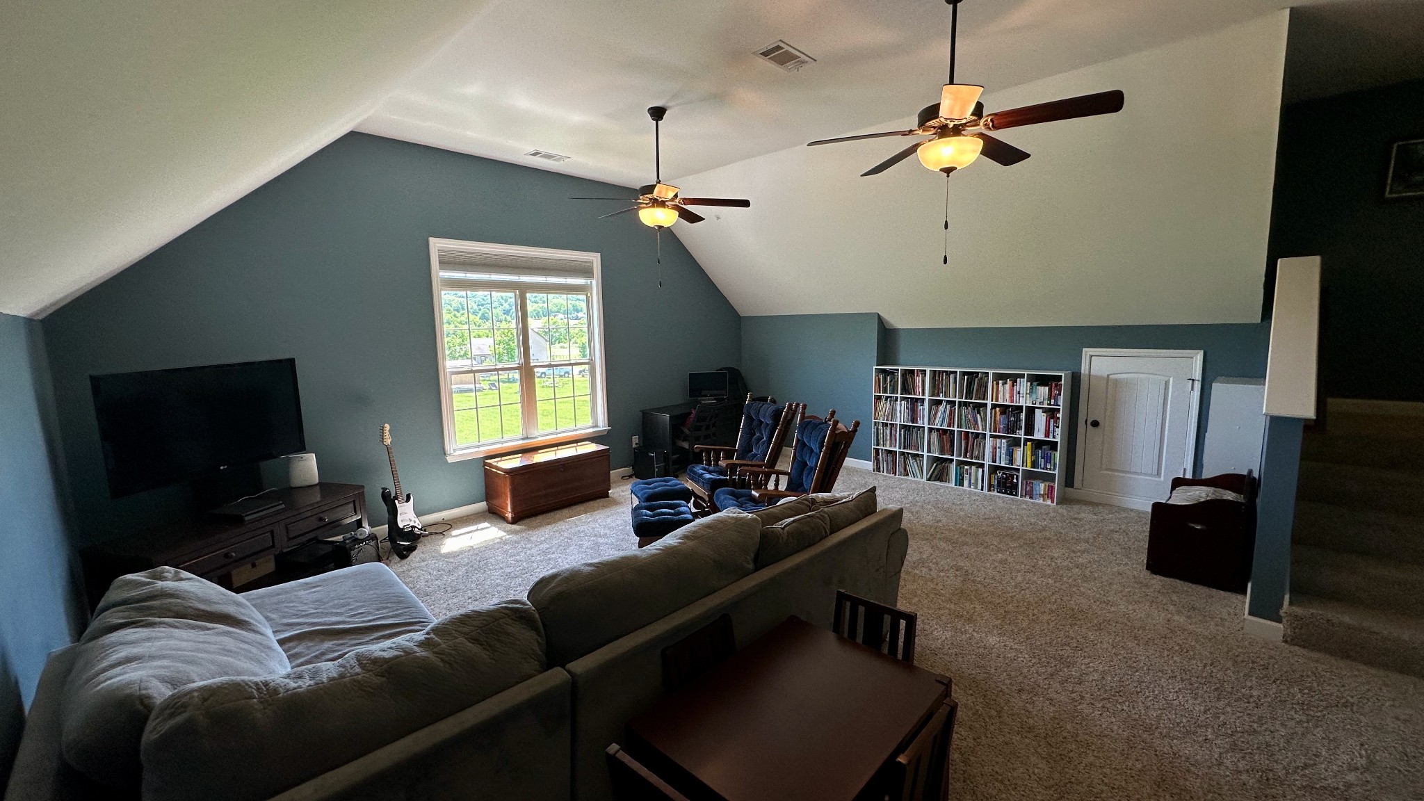 509 Neal Road Watertown, TN 37184 - Photo 40 of 48 a living room with furniture and a flat screen tv