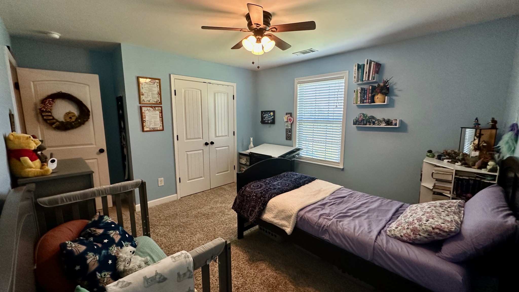 509 Neal Road Watertown, TN 37184 - Photo 44 of 48 a bedroom with a bed and a chandelier