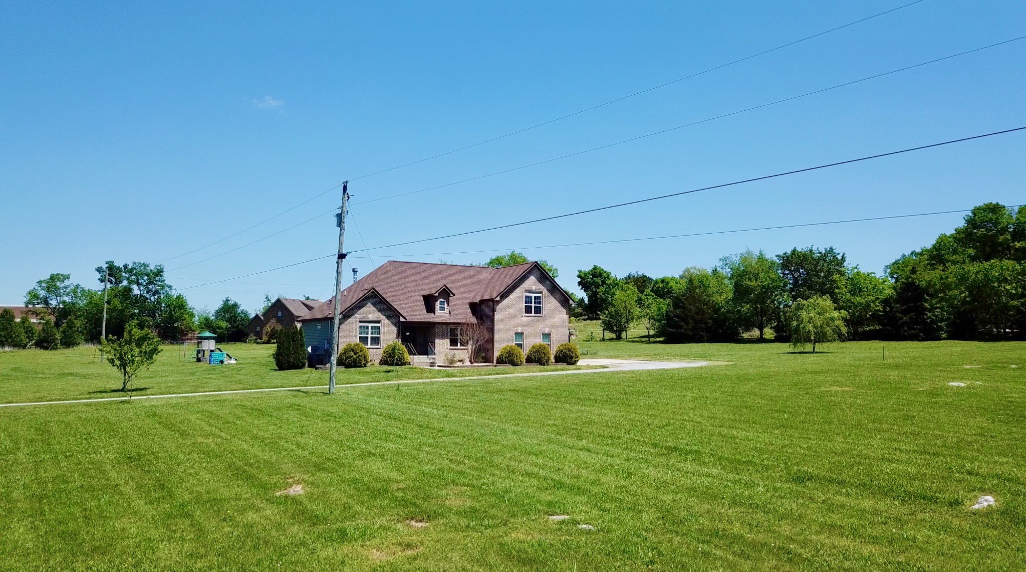 509 Neal Road Watertown, TN 37184 - Photo 5 of 48 a front view of a house with a yard