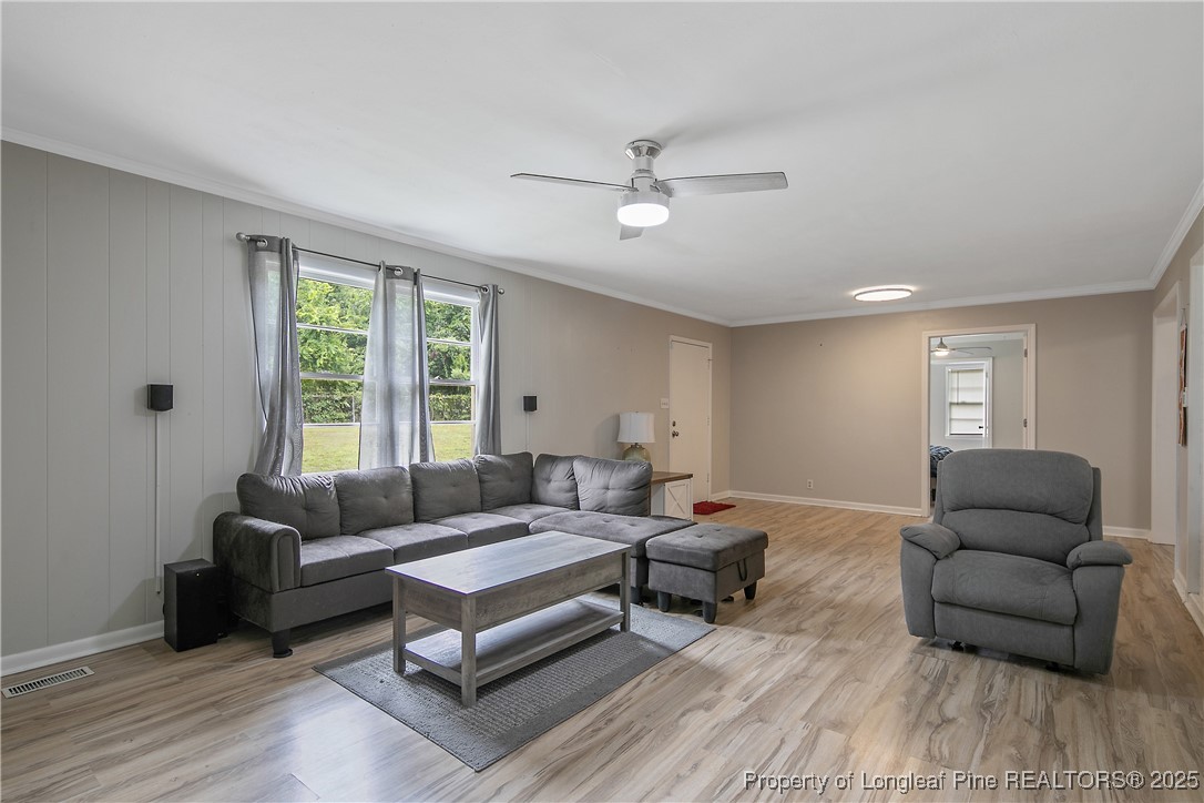 4914 Pinewood Drive Hope Mills, NC 28348 - Photo 11 of 36 a living room with furniture and a large window