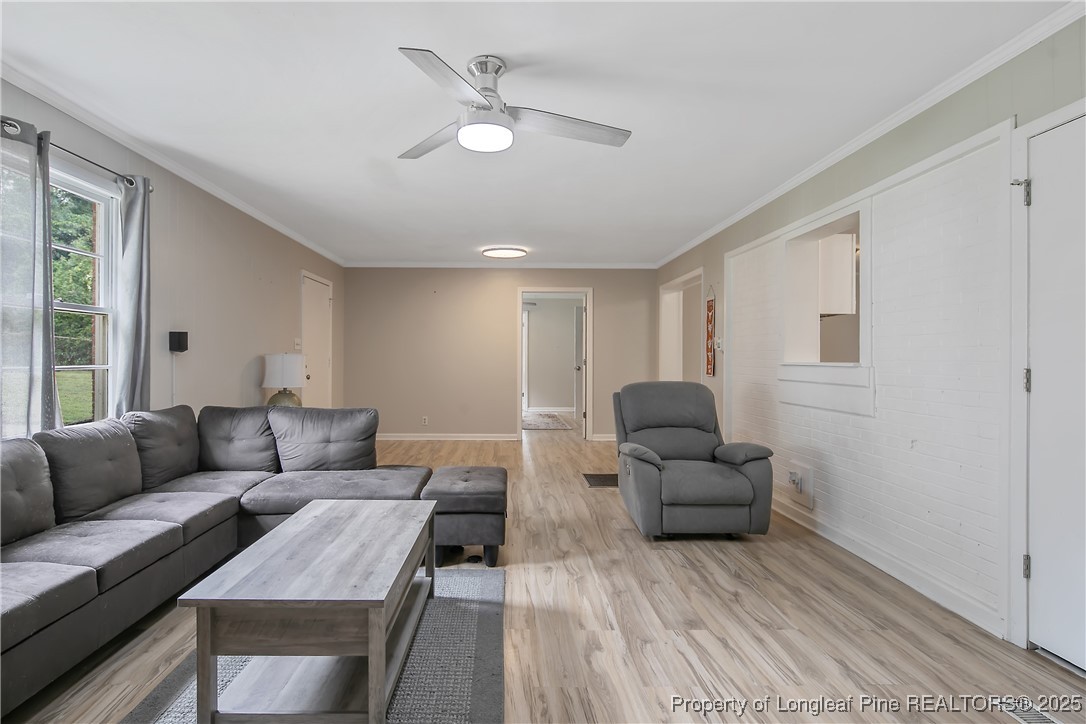 4914 Pinewood Drive Hope Mills, NC 28348 - Photo 12 of 36 a living room with furniture and a couch