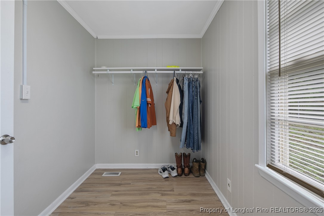 4914 Pinewood Drive Hope Mills, NC 28348 - Photo 17 of 36 a view of walk in closet with clothes and shoes