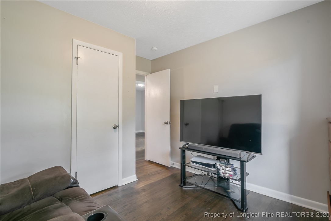 4914 Pinewood Drive Hope Mills, NC 28348 - Photo 26 of 36 a living room with furniture and a flat screen tv