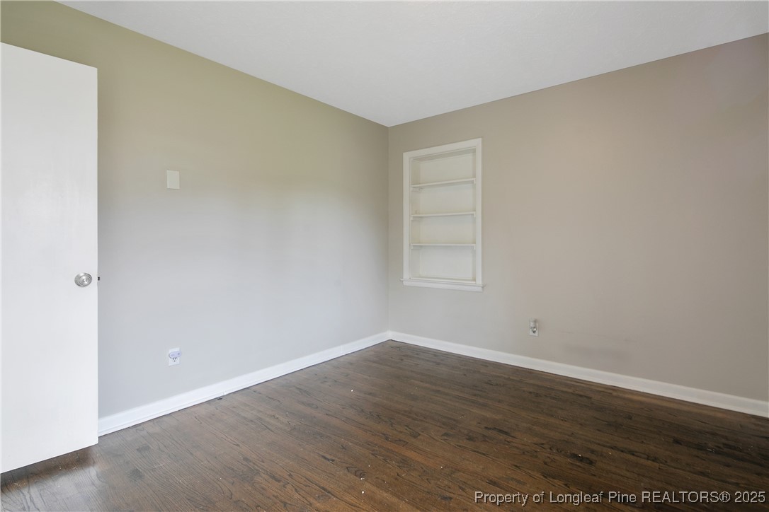 4914 Pinewood Drive Hope Mills, NC 28348 - Photo 31 of 36 a view of an empty room with wooden floor