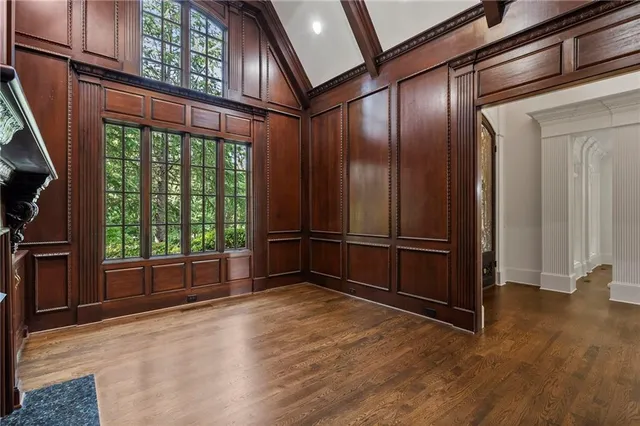 a view of an entryway with wooden floor
