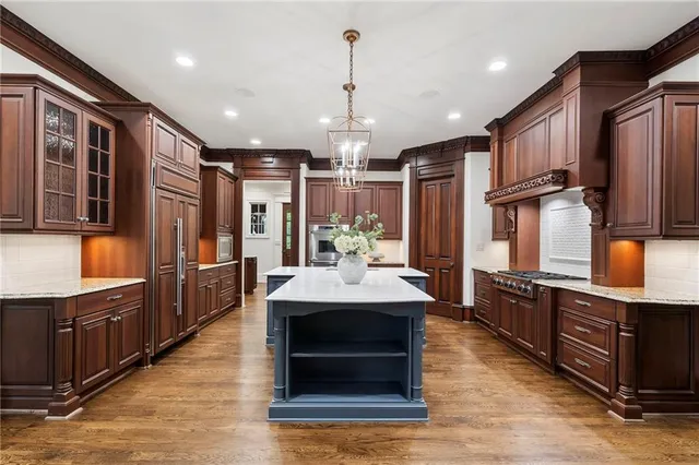 a view of a porch with a floor to ceiling window and fire pit