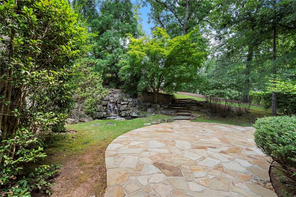 989 Middle Fork Trail Suwanee, GA 30024 - Photo 61 of 76 a view of backyard with outdoor space