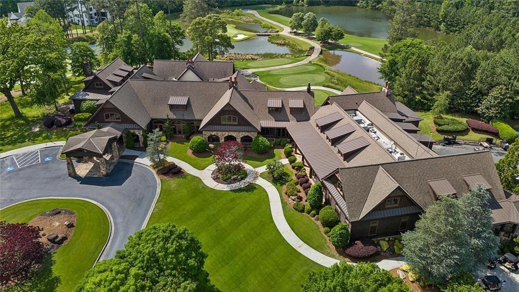 989 Middle Fork Trail Suwanee, GA 30024 - Photo 63 of 76 an aerial view of a house with swimming pool and outdoor seating