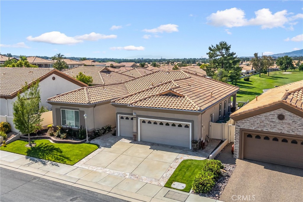 5233 Hampton Road Banning, CA 92220 - Photo 35 of 46 a front view of a house with garden