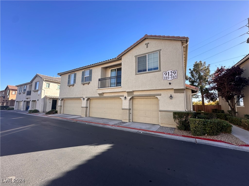 9129 Ripple Ridge Avenue, Unit 102 Las Vegas, NV 89149 - Photo 1 of 7