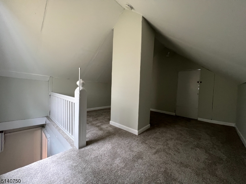 193 Forest Street, Unit 1 Montclair, NJ 07042 - Photo 17 of 20 an empty room with a bathroom