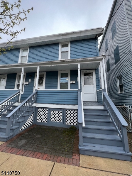 193 Forest Street, Unit 1 Montclair, NJ 07042 - Photo 3 of 20 a view of a house with wooden door and deck