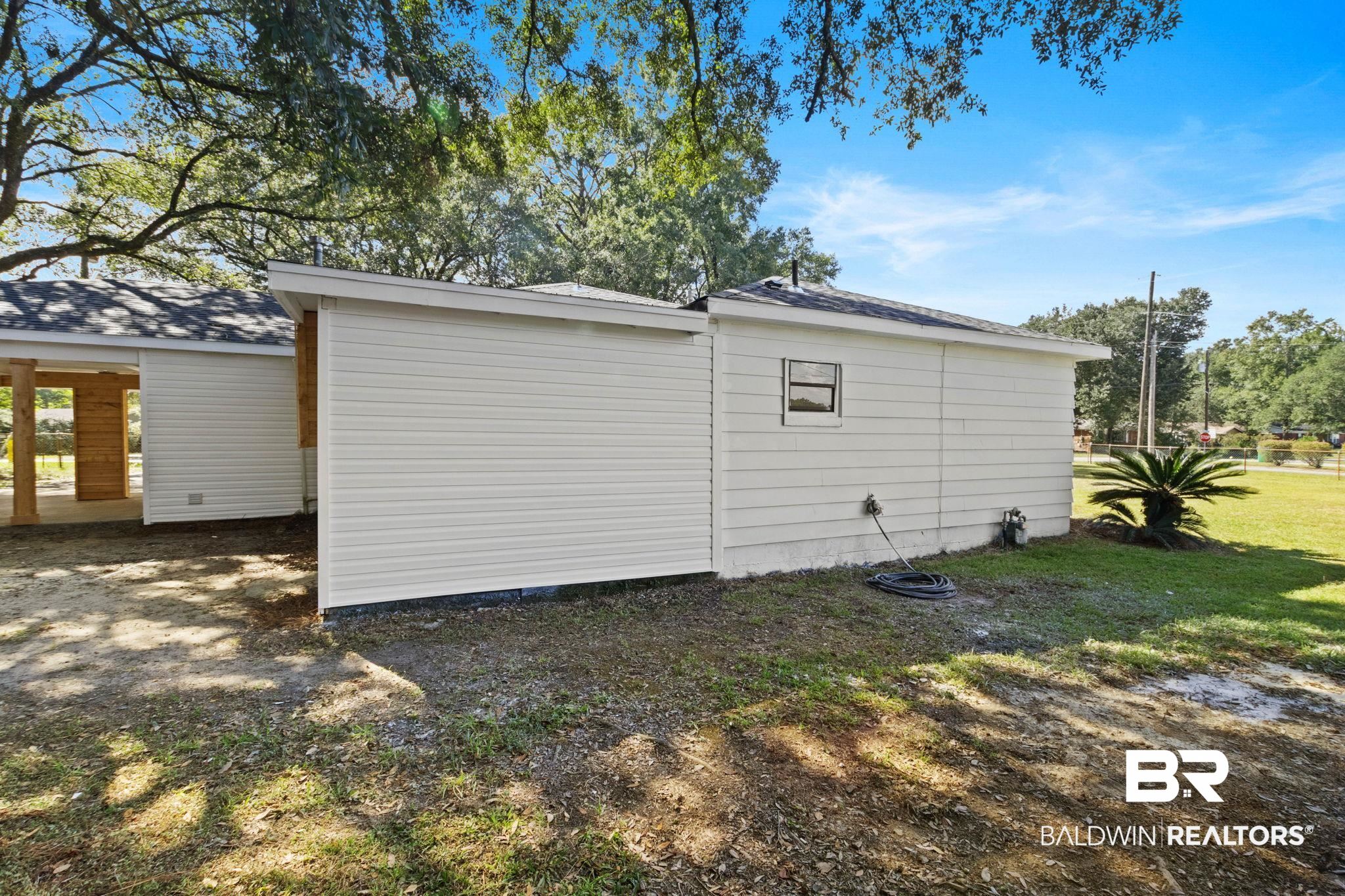 618 Pine Street Saraland, AL 36571 - Photo 28 of 41 View of side of home with a yard