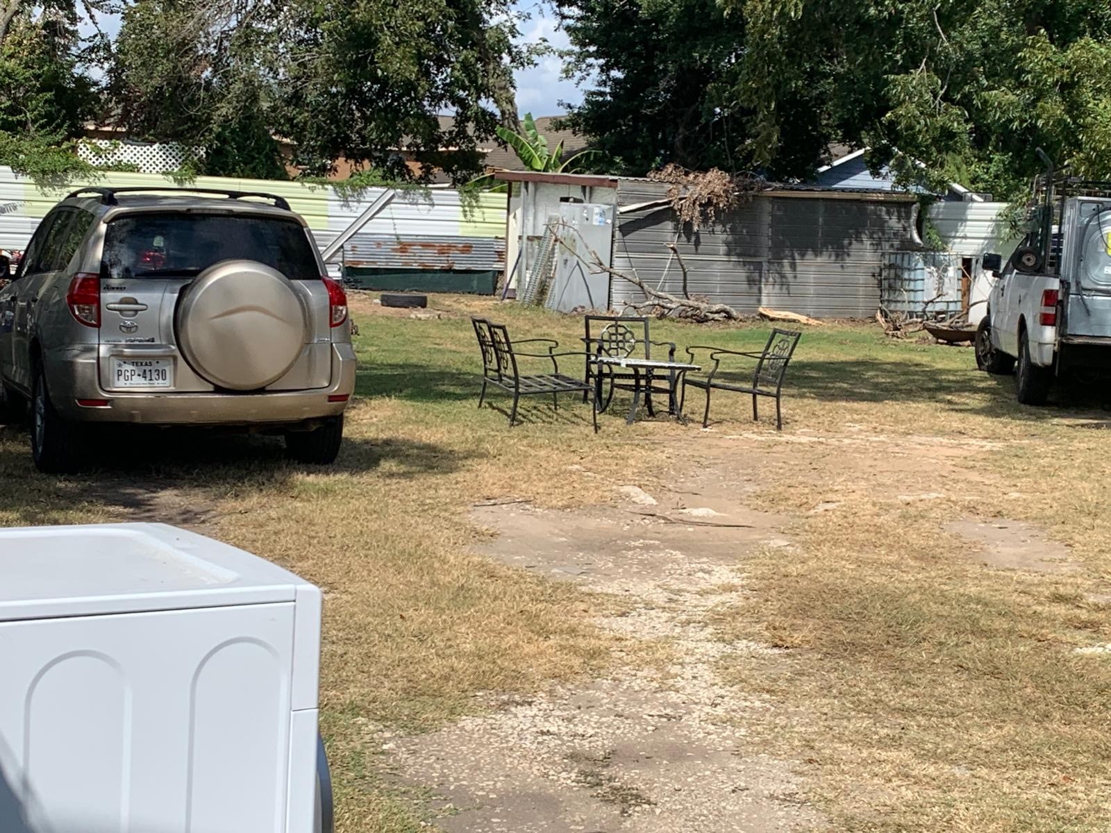 7 West Court Drive Houston, TX 77017 - Photo 5 of 6 a view of backyard with table and chairs