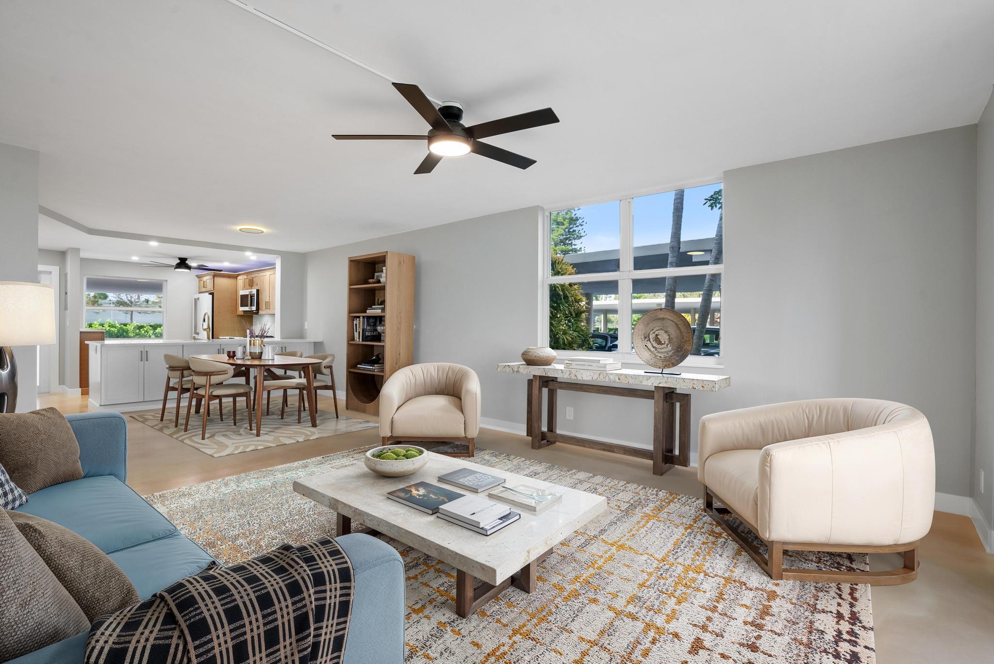 2525 Florida Boulevard, Unit 127 Delray Beach, FL 33483 - Photo 15 of 62 a living room with furniture and wooden floor