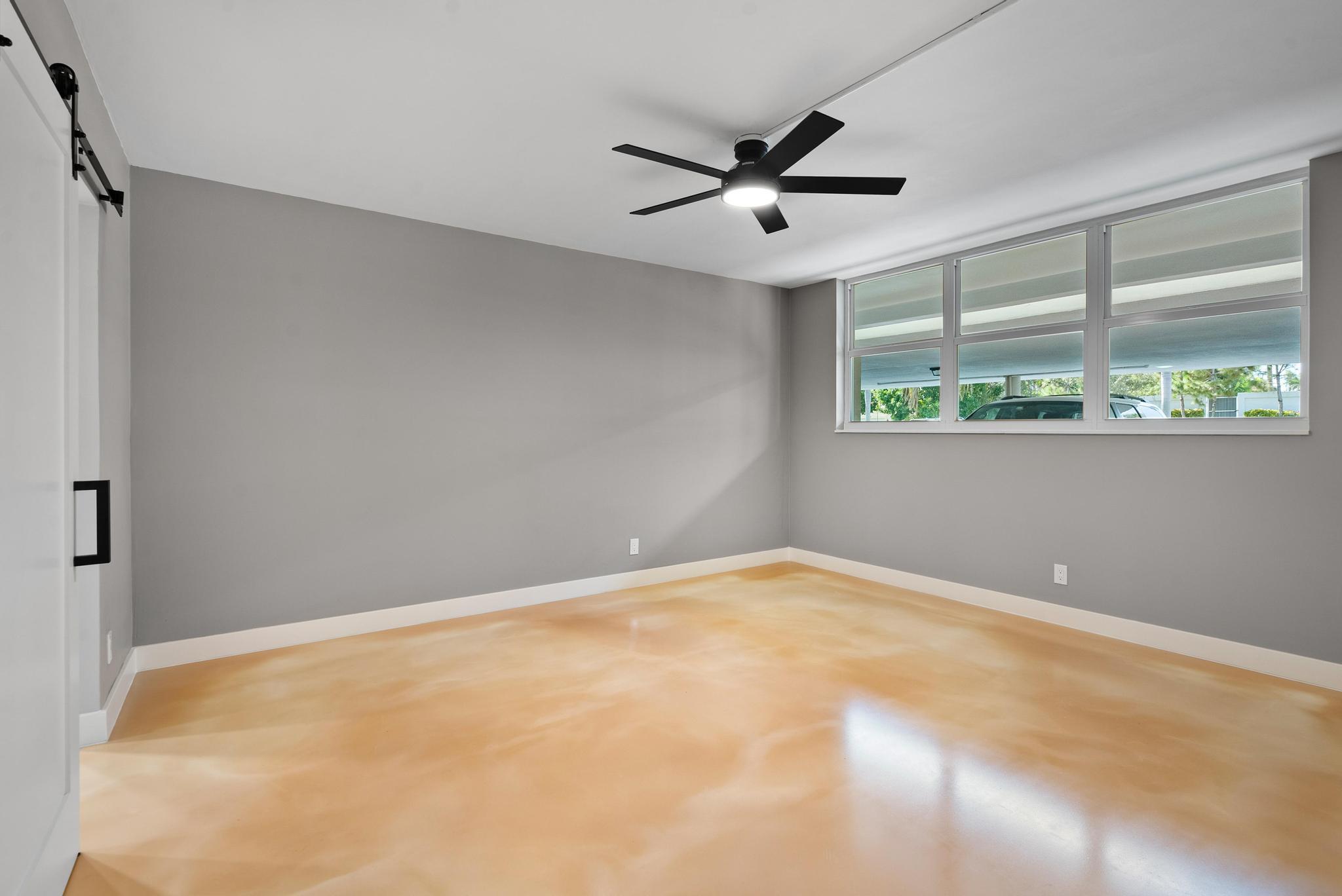2525 Florida Boulevard, Unit 127 Delray Beach, FL 33483 - Photo 29 of 62 a view of an empty room with a window