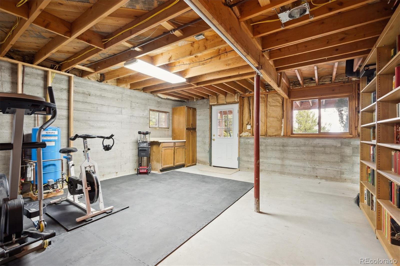 11094 Thomas Drive Conifer, CO 80433 - Photo 34 of 44 a view of a room with gym equipment