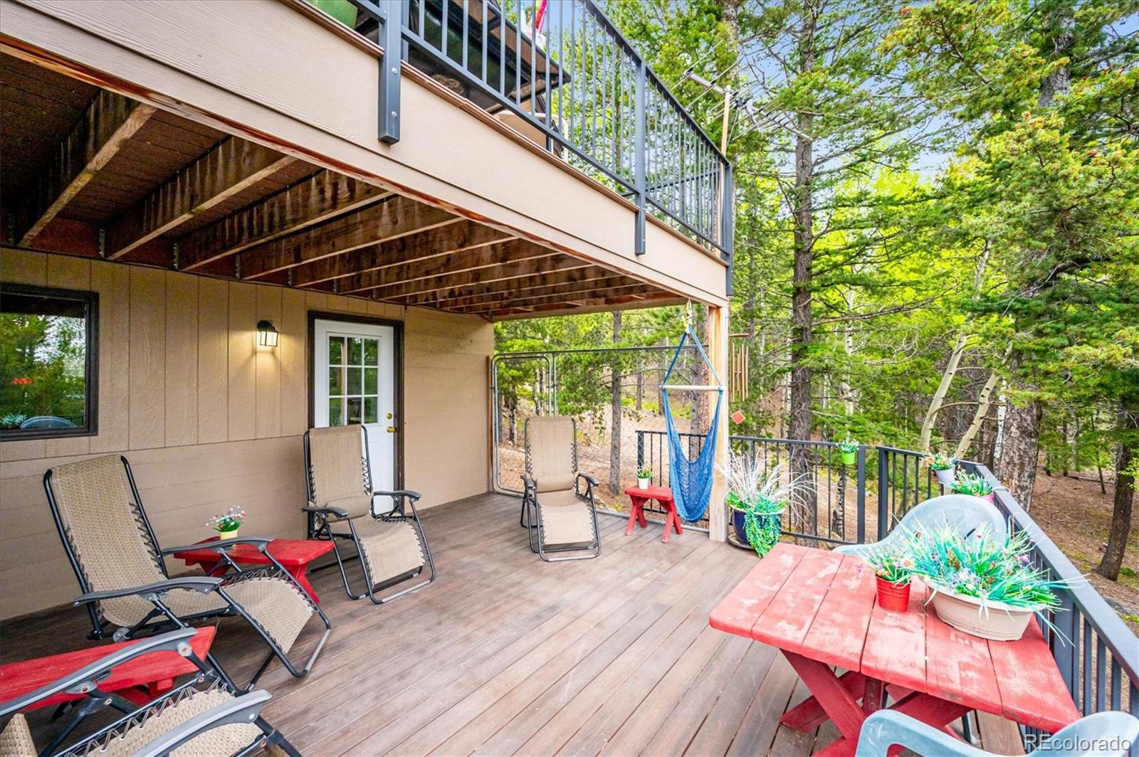 11094 Thomas Drive Conifer, CO 80433 - Photo 35 of 44 a view of deck with patio