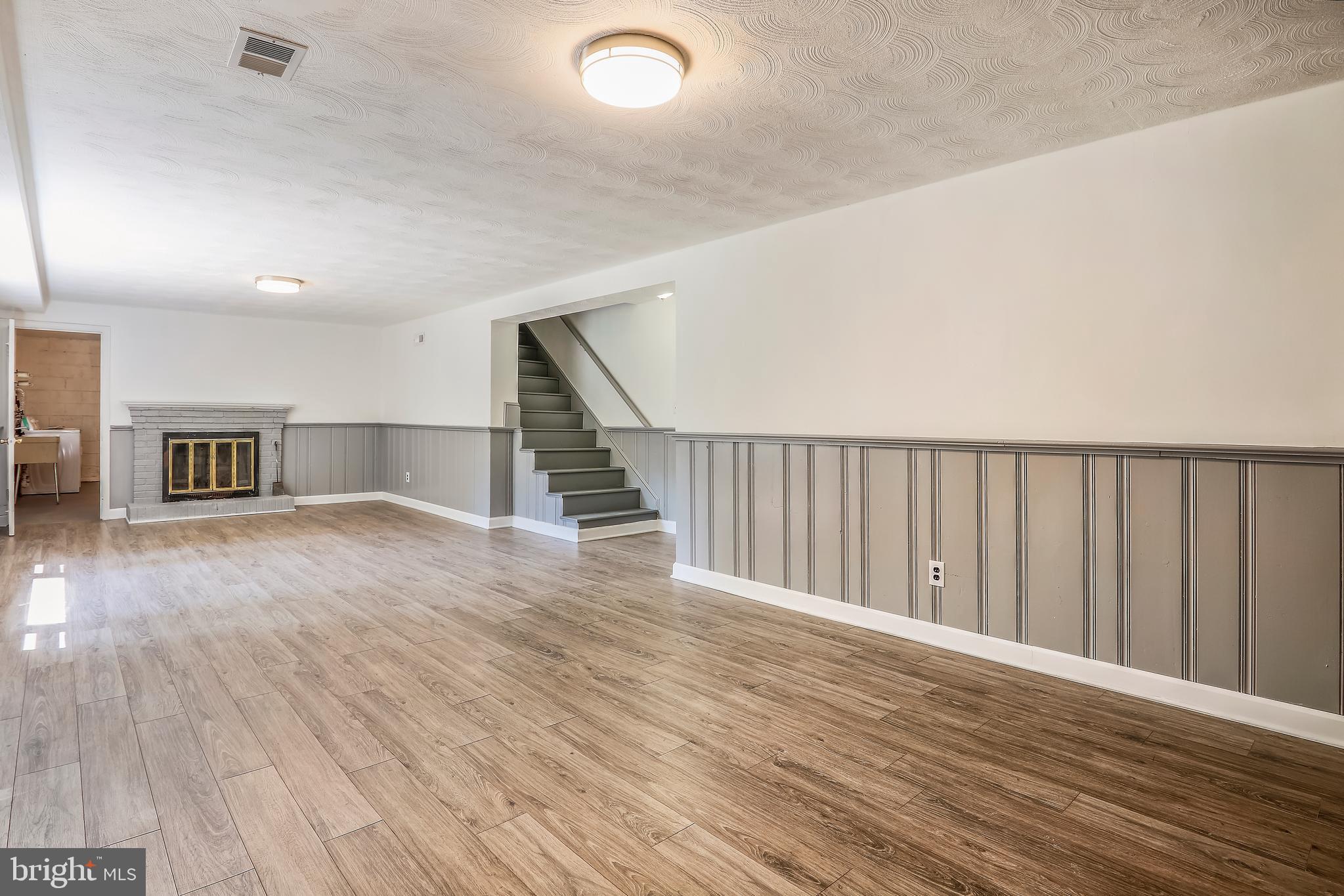 4501 Henderson Road Temple Hills, MD 20748 - Photo 25 of 45 lower level family room