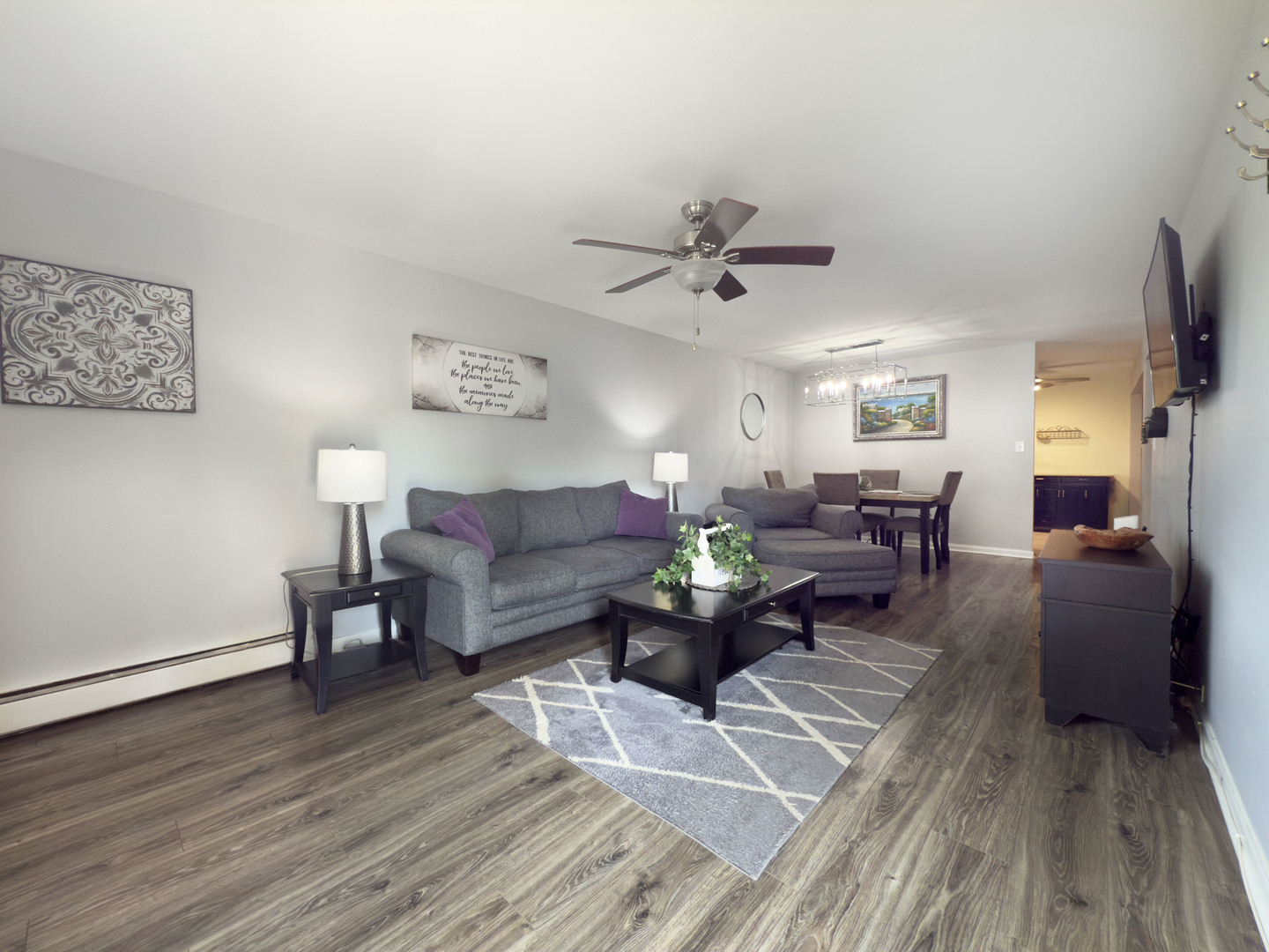 1313 Rebecca Road, Unit 118 Lombard, IL 60148 - Photo 2 of 19 a living room with furniture and a flat screen tv