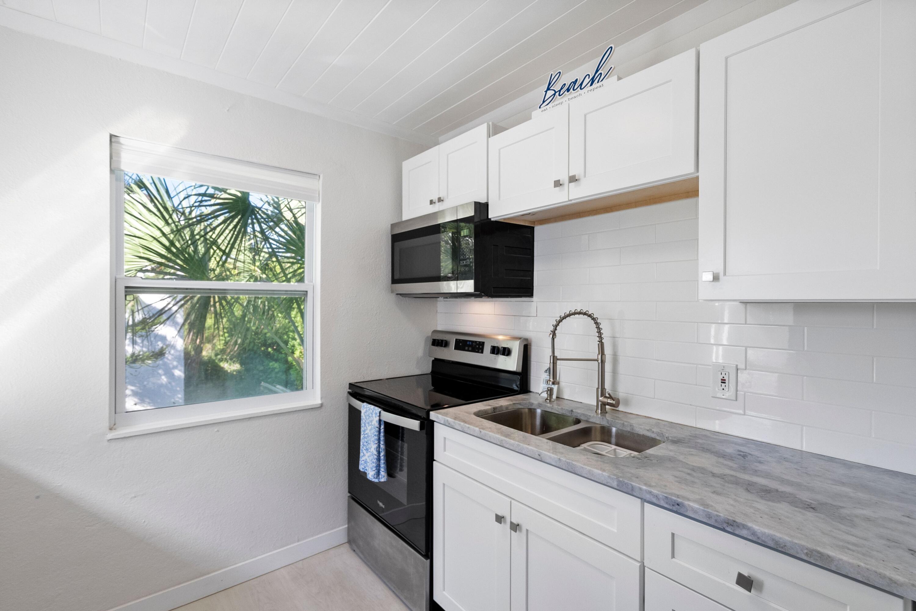 670 Hernando Street, Unit D Fort Pierce, FL 34949 - Photo 7 of 24 Kitchen 3