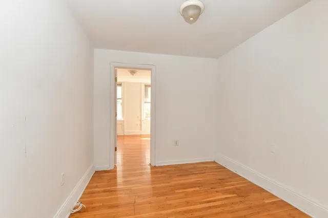 a view of an empty room and window