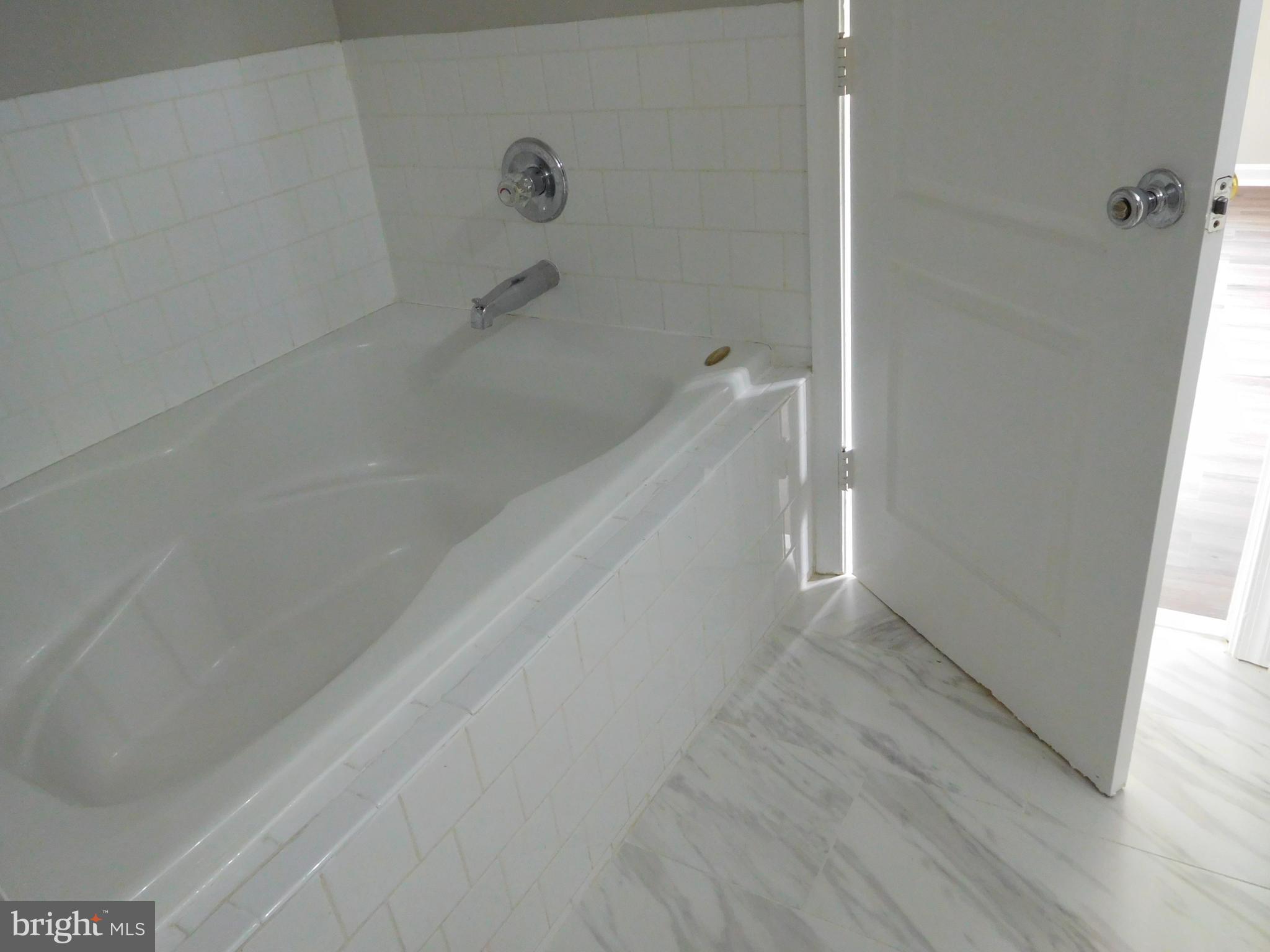 9900 Doubletree Lane Bowie, MD 20721 - Photo 9 of 18 a view of a bathroom