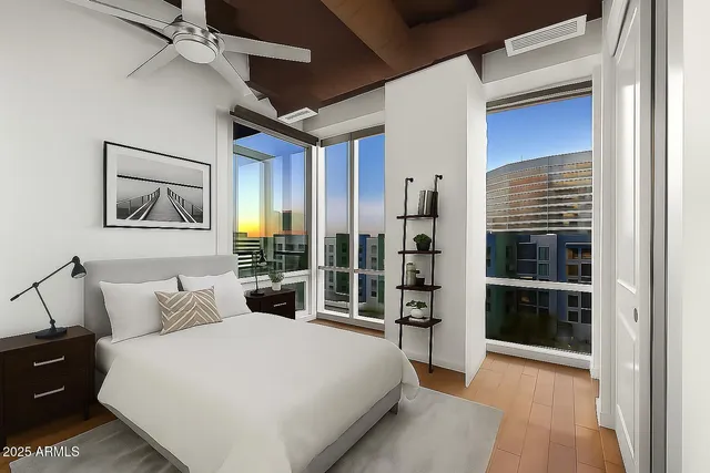 a view of a house with yard and sitting area